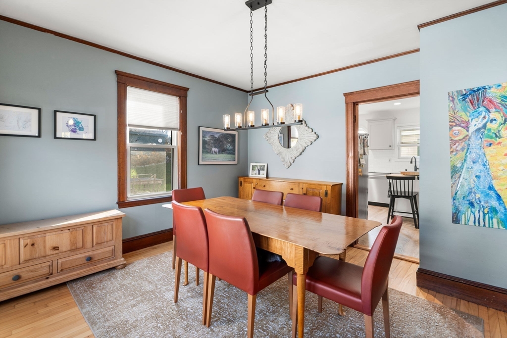 11 Pickman Road Salem, MA 01970 - Photo 9 of 40 a dining room with furniture a chandelier and window