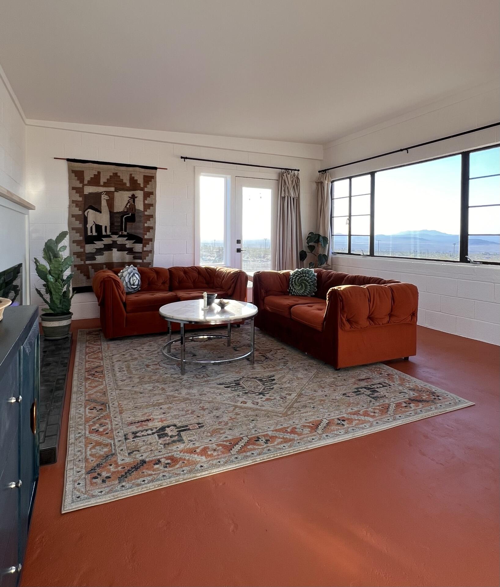 52079 Ocotillo Road Johnson Valley, CA 92285 - Photo 16 of 51 a living room with furniture and a rug