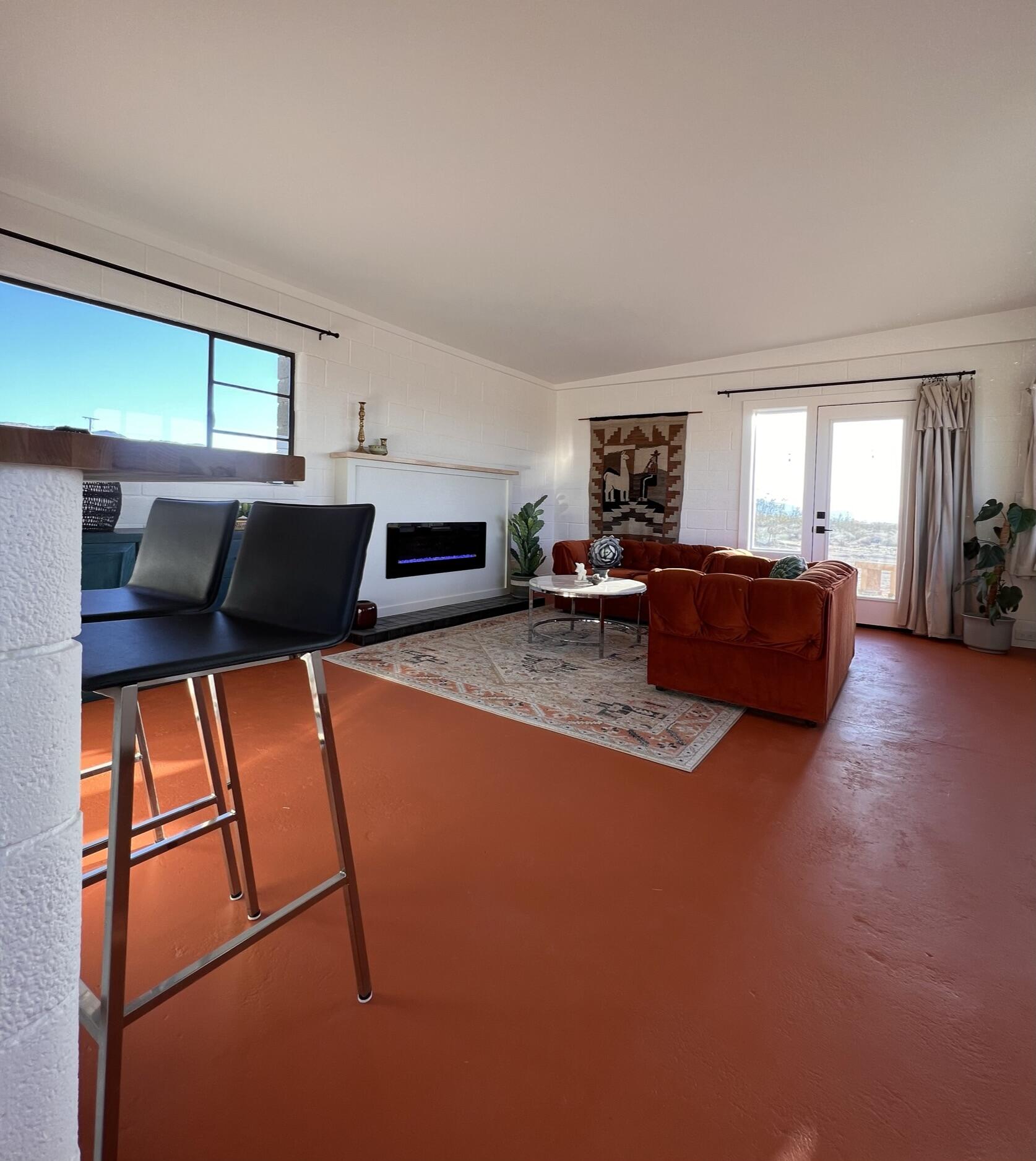 52079 Ocotillo Road Johnson Valley, CA 92285 - Photo 18 of 51 a living room with furniture and a flat screen tv