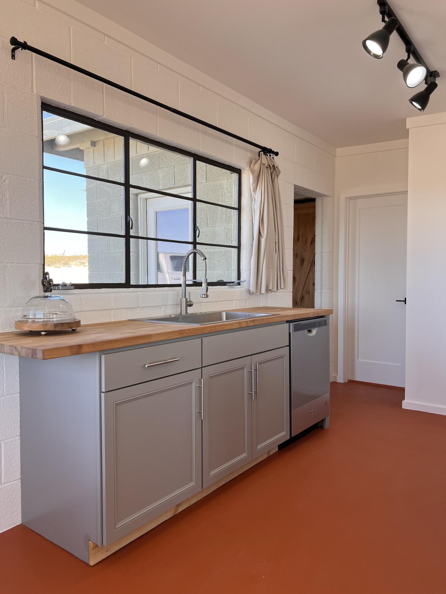 52079 Ocotillo Road Johnson Valley, CA 92285 - Photo 29 of 51 a kitchen with a sink and a window