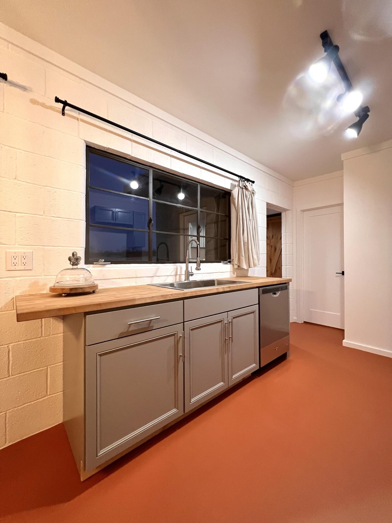 52079 Ocotillo Road Johnson Valley, CA 92285 - Photo 30 of 51 a kitchen with granite countertop a sink and cabinets