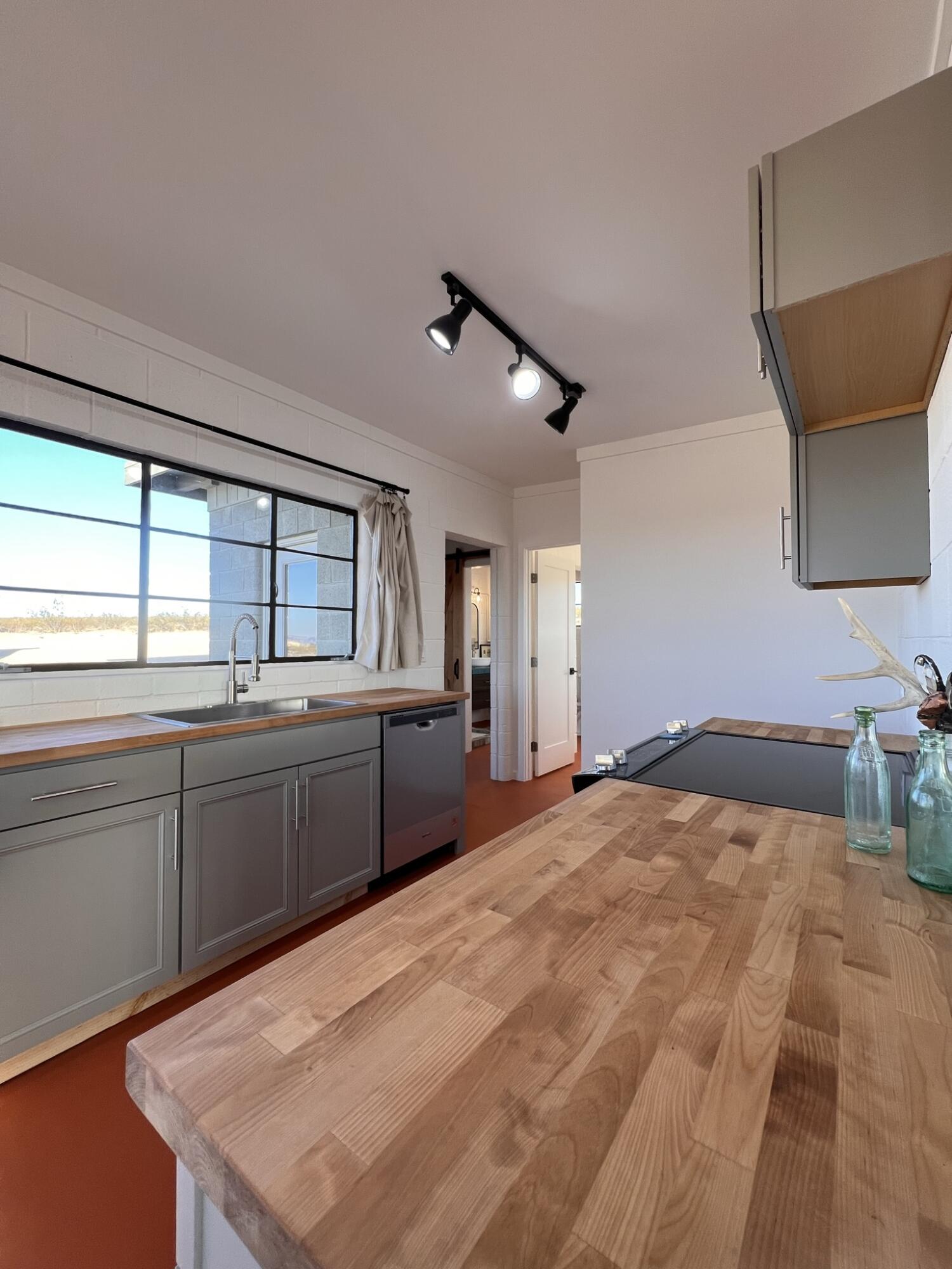 52079 Ocotillo Road Johnson Valley, CA 92285 - Photo 31 of 51 a room with a bed and a window