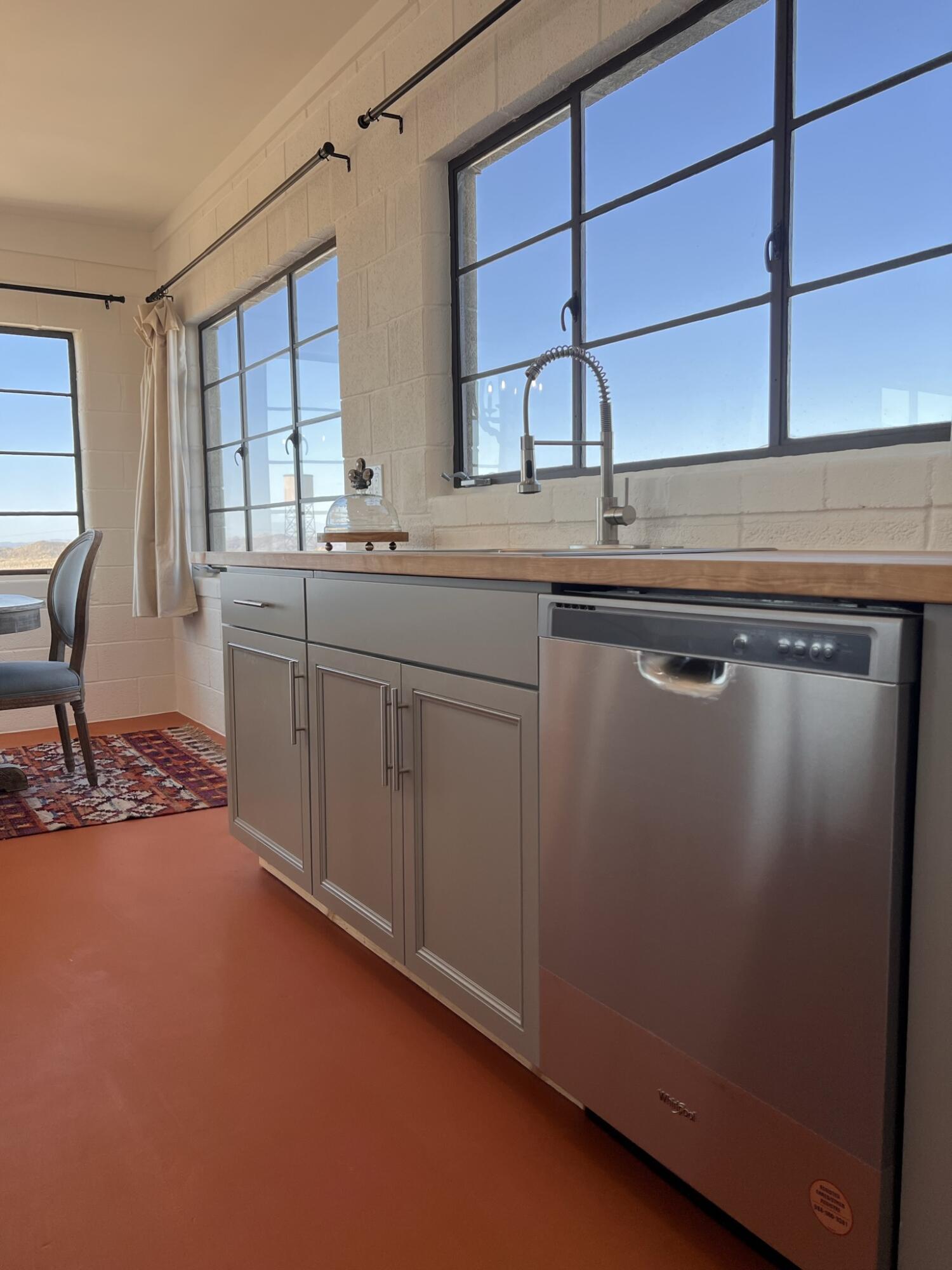 52079 Ocotillo Road Johnson Valley, CA 92285 - Photo 33 of 51 a kitchen with a sink cabinets and a window