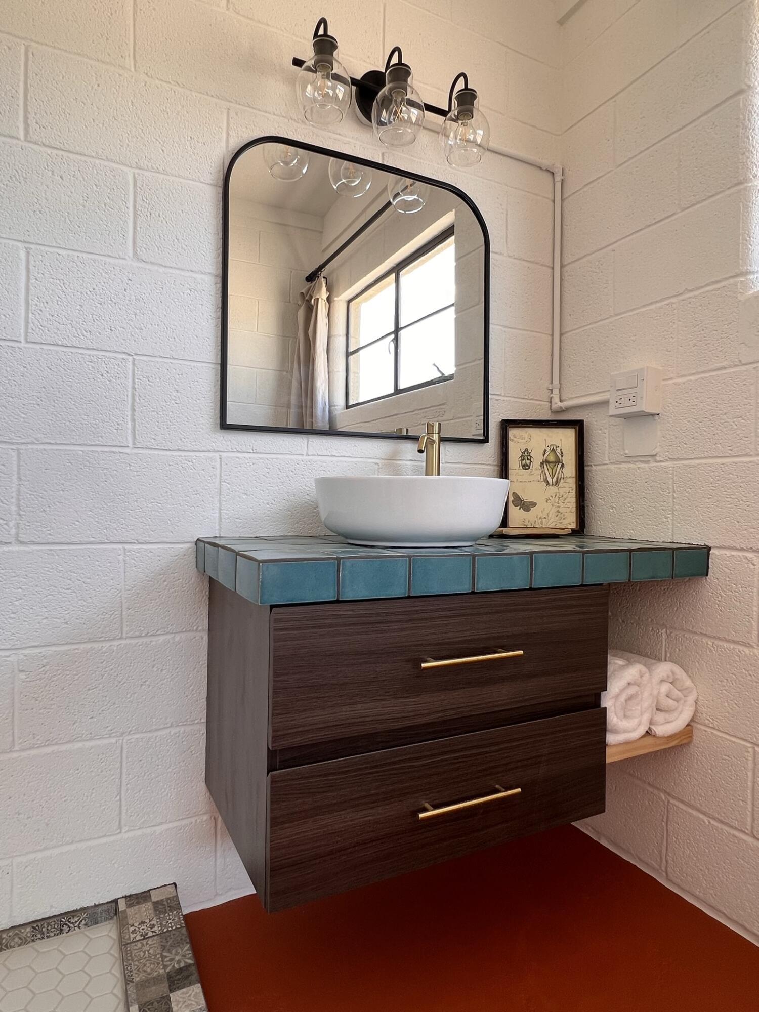 52079 Ocotillo Road Johnson Valley, CA 92285 - Photo 40 of 51 a bathroom with a sink a toilet and mirror
