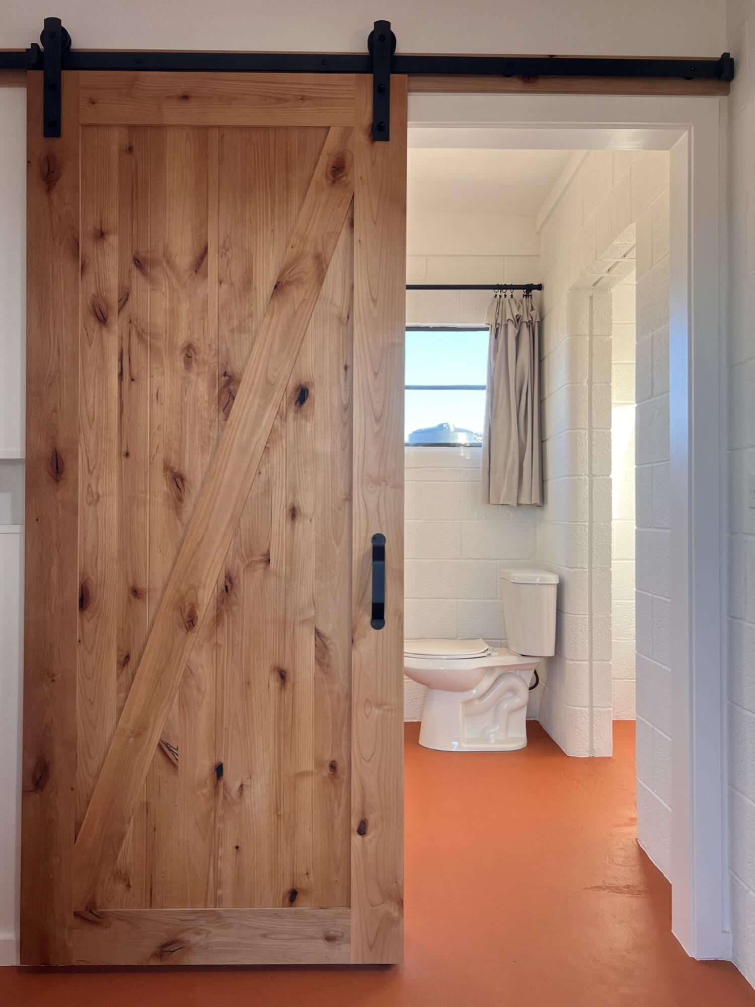 52079 Ocotillo Road Johnson Valley, CA 92285 - Photo 44 of 51 a bathroom with a granite countertop shower and a toilet