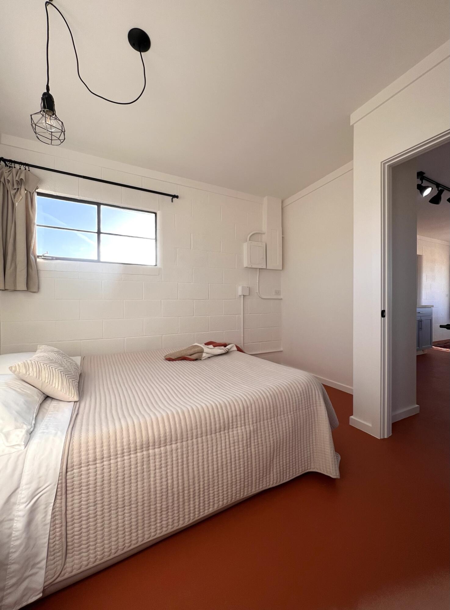 52079 Ocotillo Road Johnson Valley, CA 92285 - Photo 51 of 51 a bedroom with a bed and cabinets