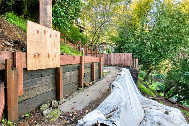a view of balcony with wooden floor