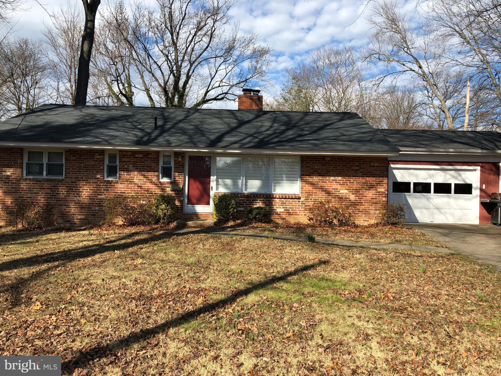 6320 Howe Place Springfield, VA 22150 - Photo 1 of 1 a view of a house with a yard