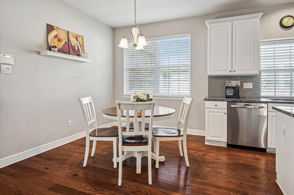 7509 Cedar Elm Drive Irving, TX 75063 - Photo 12 of 40 a dining room with wooden floor and breakfast area