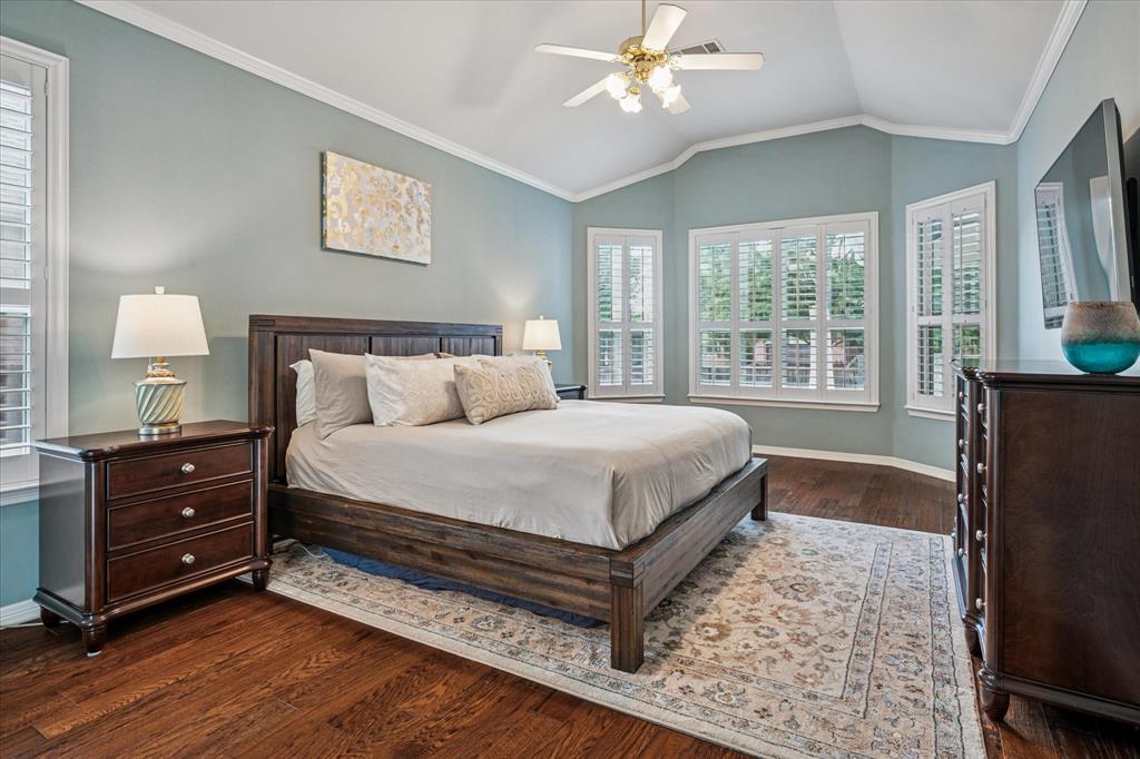 7509 Cedar Elm Drive Irving, TX 75063 - Photo 14 of 40 a bedroom with a bed dresser and a window