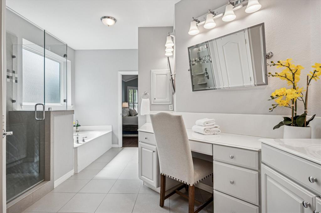 7509 Cedar Elm Drive Irving, TX 75063 - Photo 16 of 40 a dining room with granite countertop furniture and a mirror