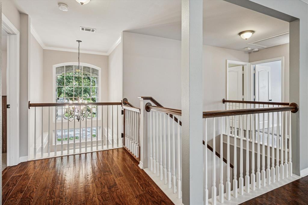 7509 Cedar Elm Drive Irving, TX 75063 - Photo 19 of 40 a view of a room with wooden floor
