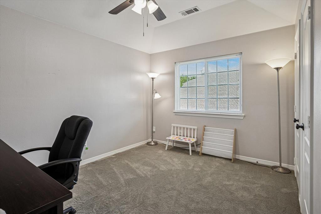 7509 Cedar Elm Drive Irving, TX 75063 - Photo 24 of 40 a view of a room with windows and lounge chair