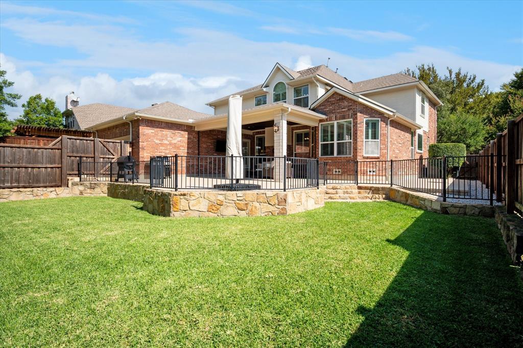 7509 Cedar Elm Drive Irving, TX 75063 - Photo 31 of 40 a view of a house with a yard porch and sitting area