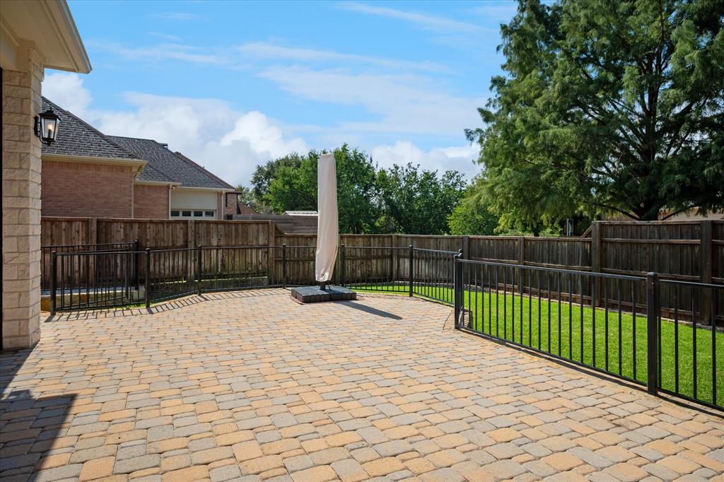 7509 Cedar Elm Drive Irving, TX 75063 - Photo 34 of 40 a view of backyard with wooden fence