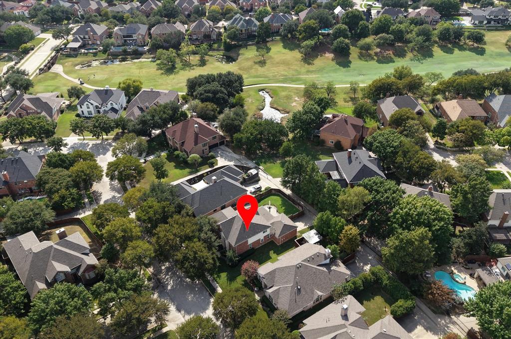 7509 Cedar Elm Drive Irving, TX 75063 - Photo 38 of 40 an aerial view of residential houses with outdoor space and swimming pool