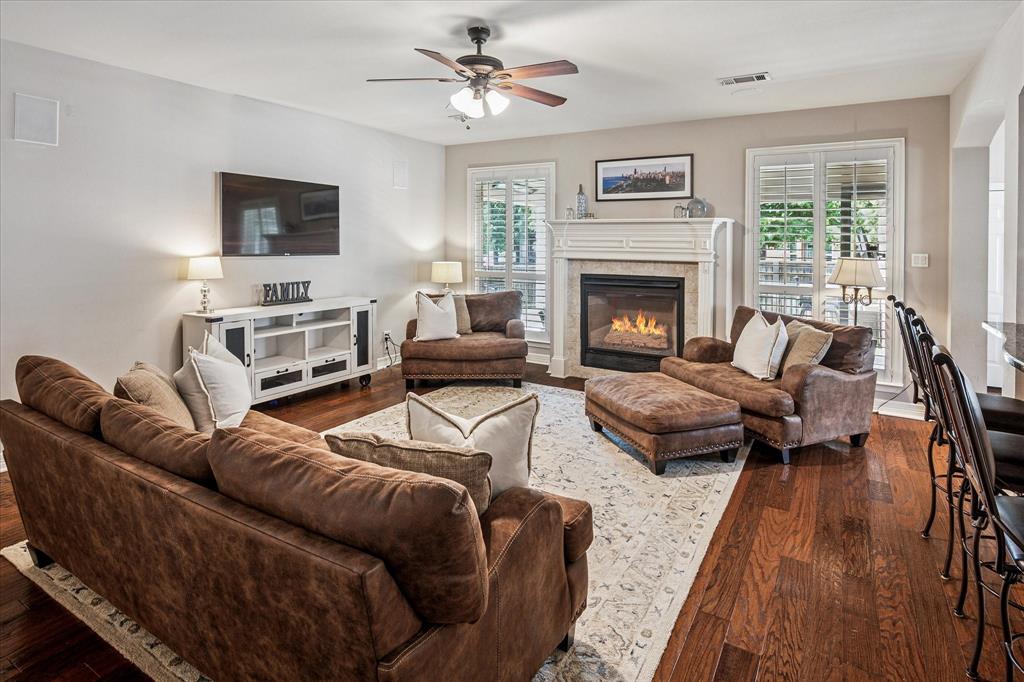 7509 Cedar Elm Drive Irving, TX 75063 - Photo 7 of 40 a living room with furniture and a fireplace