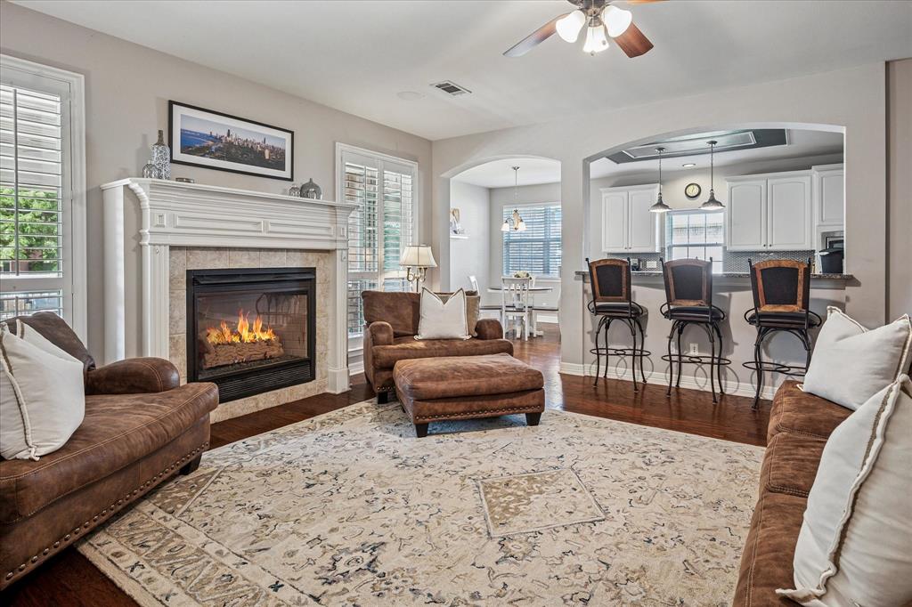 7509 Cedar Elm Drive Irving, TX 75063 - Photo 8 of 40 a living room with furniture and a fireplace