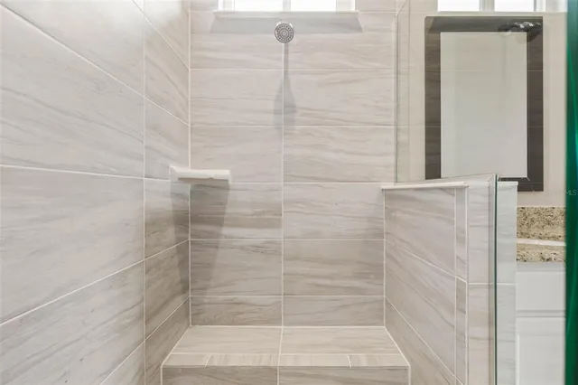 a view of an house with swimming pool and yard