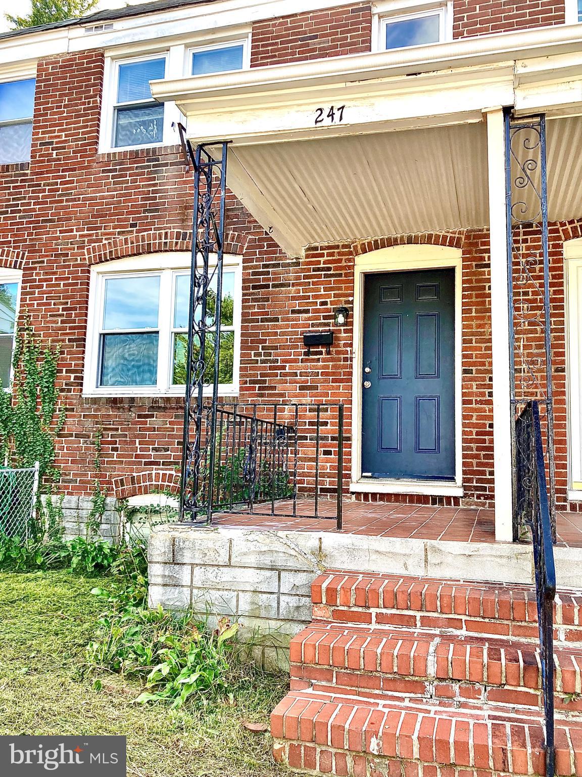 247 West Meadow Road Baltimore, MD 21225 - Photo 1 of 28 247 W Meadow Rd all brick Townhome