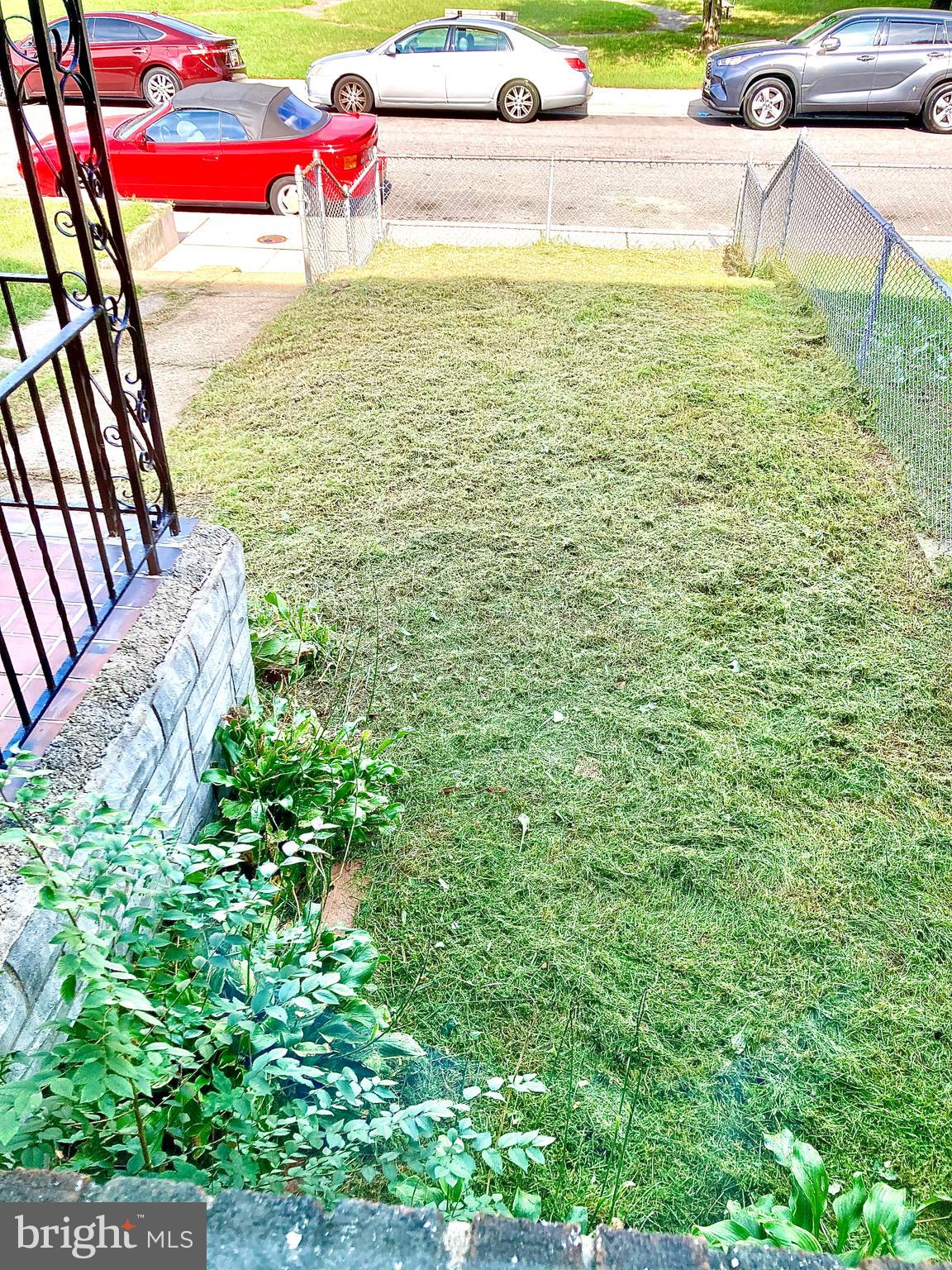 247 West Meadow Road Baltimore, MD 21225 - Photo 2 of 28 Fenced Front Yard