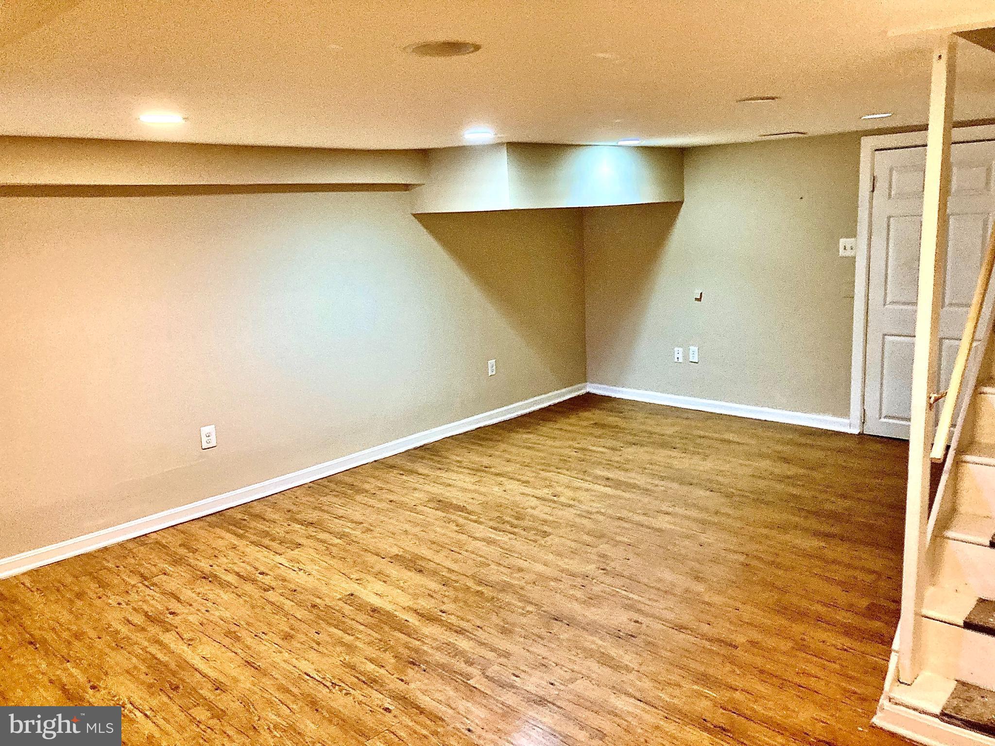 247 West Meadow Road Baltimore, MD 21225 - Photo 12 of 28 Family Room with Recessed Lighting