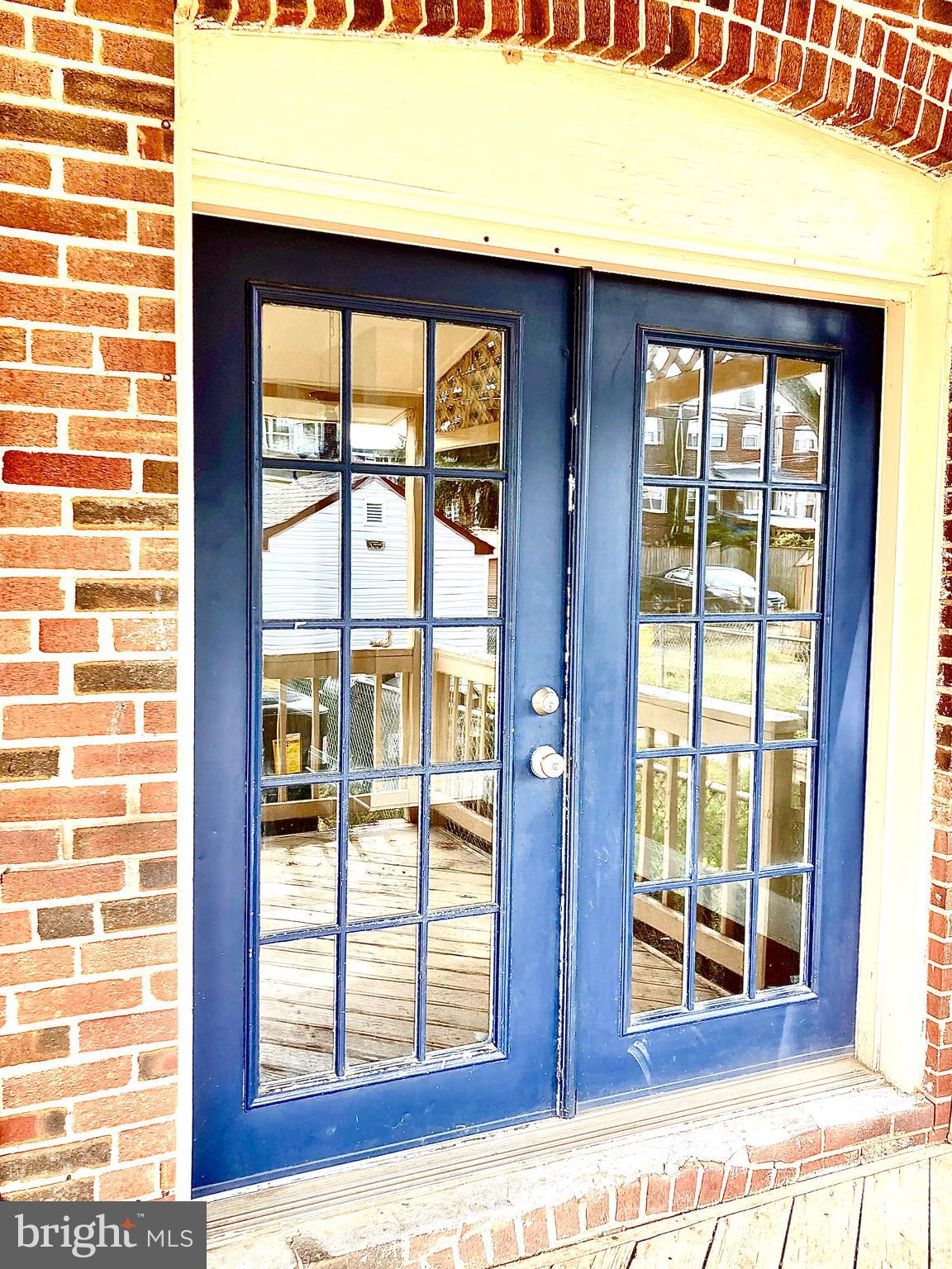 247 West Meadow Road Baltimore, MD 21225 - Photo 15 of 28 French Doors open to Deck