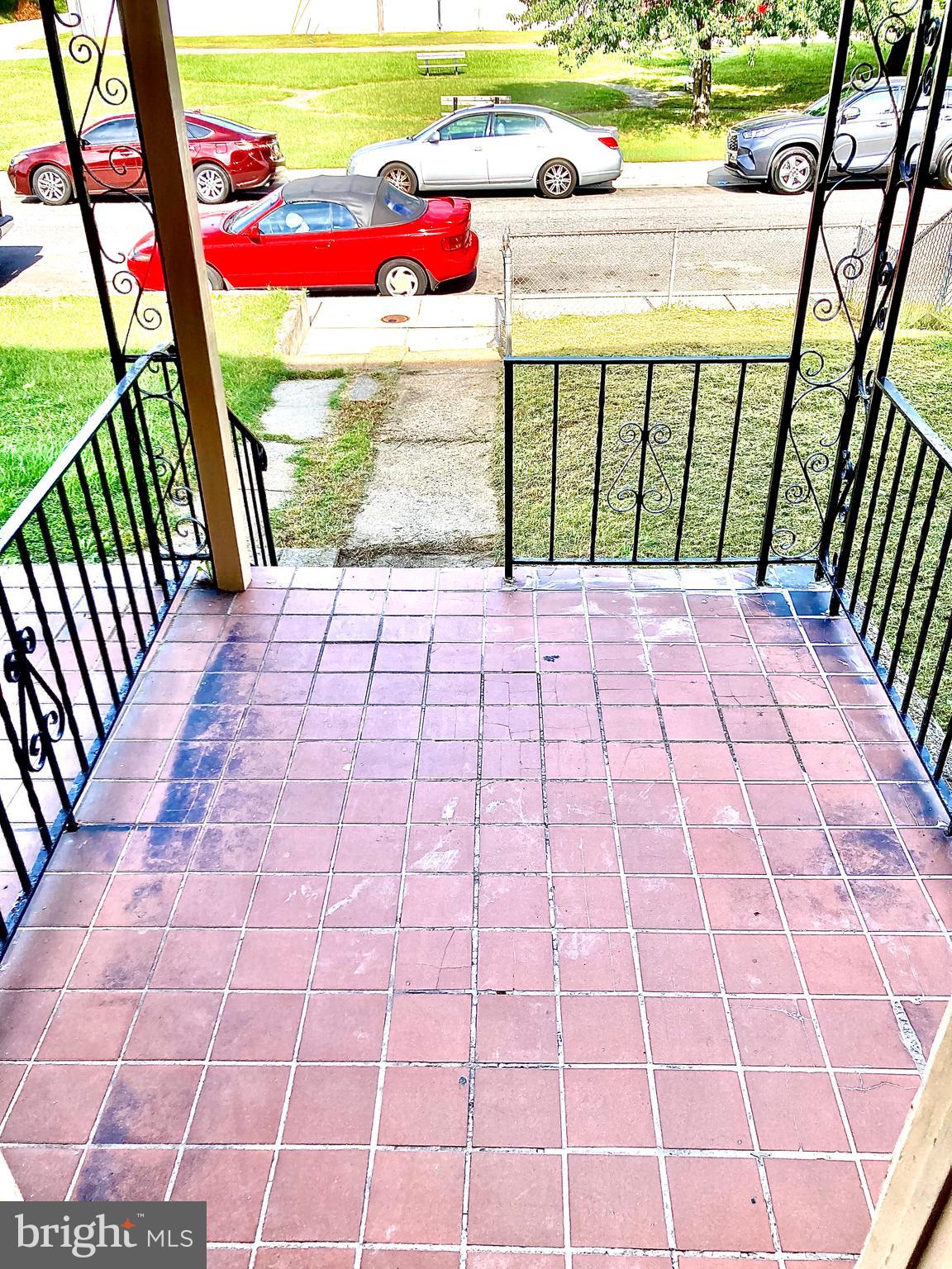 247 West Meadow Road Baltimore, MD 21225 - Photo 3 of 28 Brick Tile Front Porch