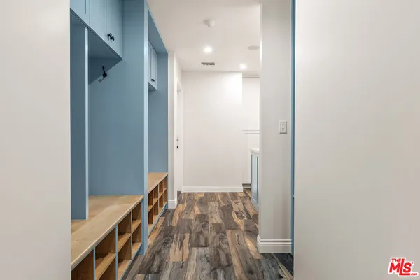 a large tub sitting next to a bathroom sink