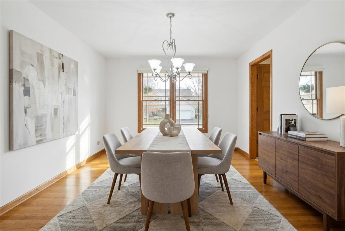 818 Wescott Road Bolingbrook, IL 60440 - Photo 13 of 33 a view of a dining room with furniture window and outside view