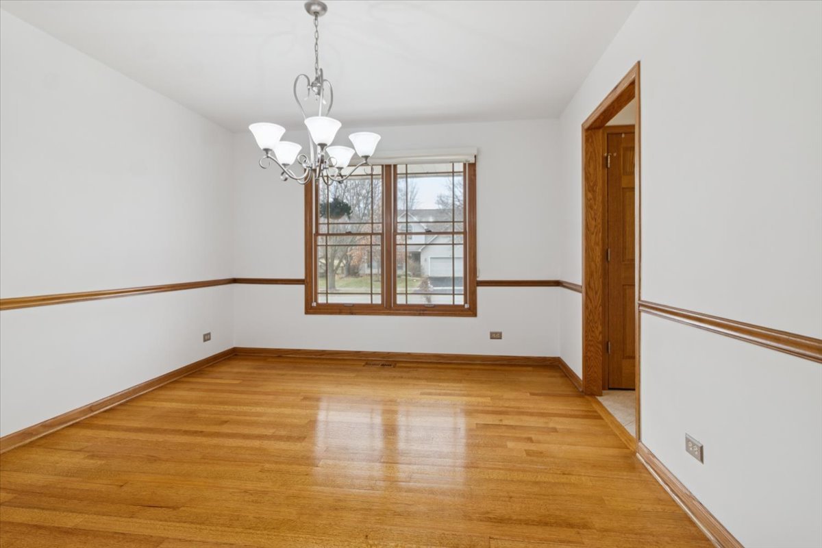 818 Wescott Road Bolingbrook, IL 60440 - Photo 14 of 33 a view of an empty room with a window