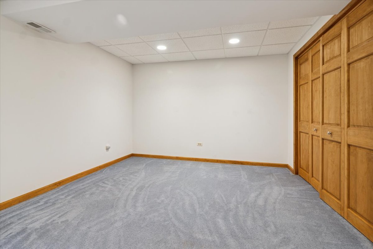 818 Wescott Road Bolingbrook, IL 60440 - Photo 29 of 33 a view of an empty room