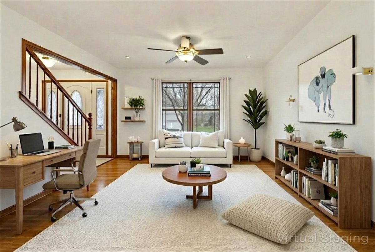 818 Wescott Road Bolingbrook, IL 60440 - Photo 3 of 33 a living room with furniture fireplace and a window