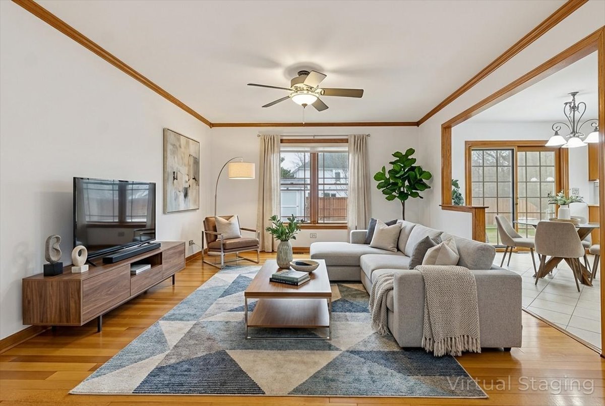 818 Wescott Road Bolingbrook, IL 60440 - Photo 5 of 33 a living room with fireplace furniture and a flat screen tv