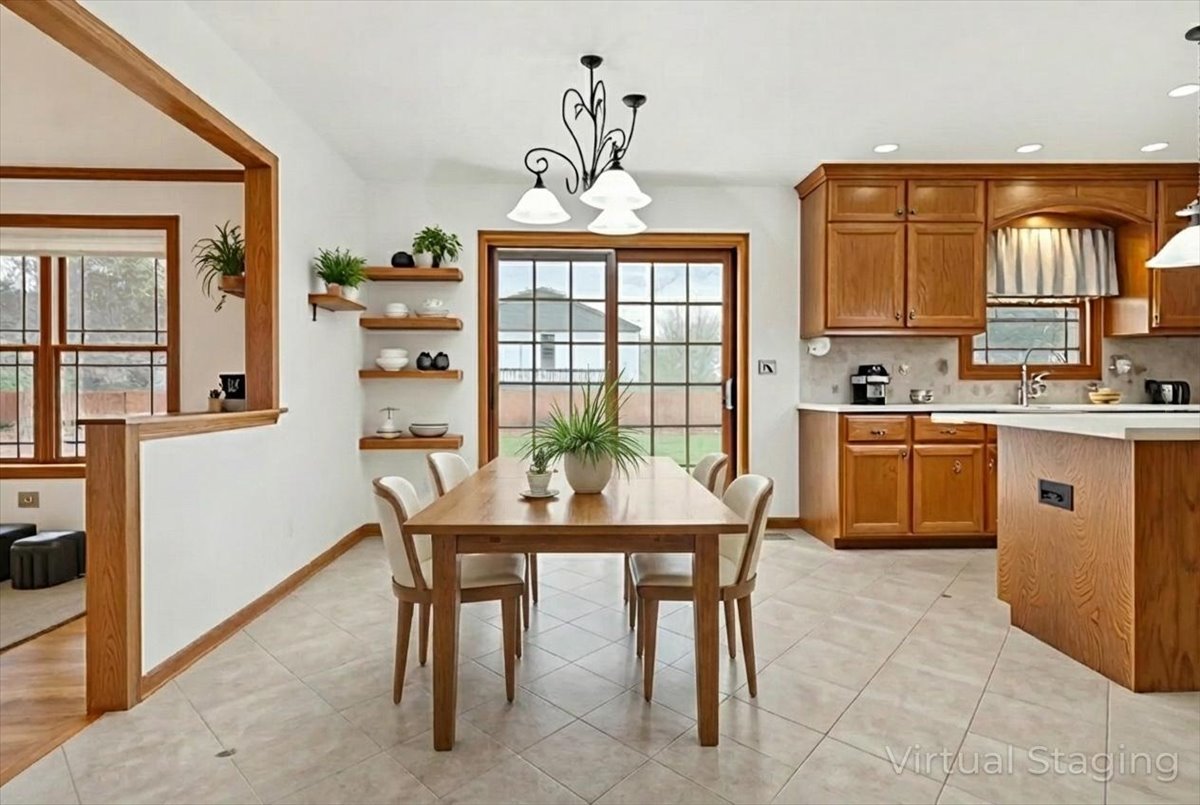 818 Wescott Road Bolingbrook, IL 60440 - Photo 8 of 33 a view of a dining room with furniture window and outside view