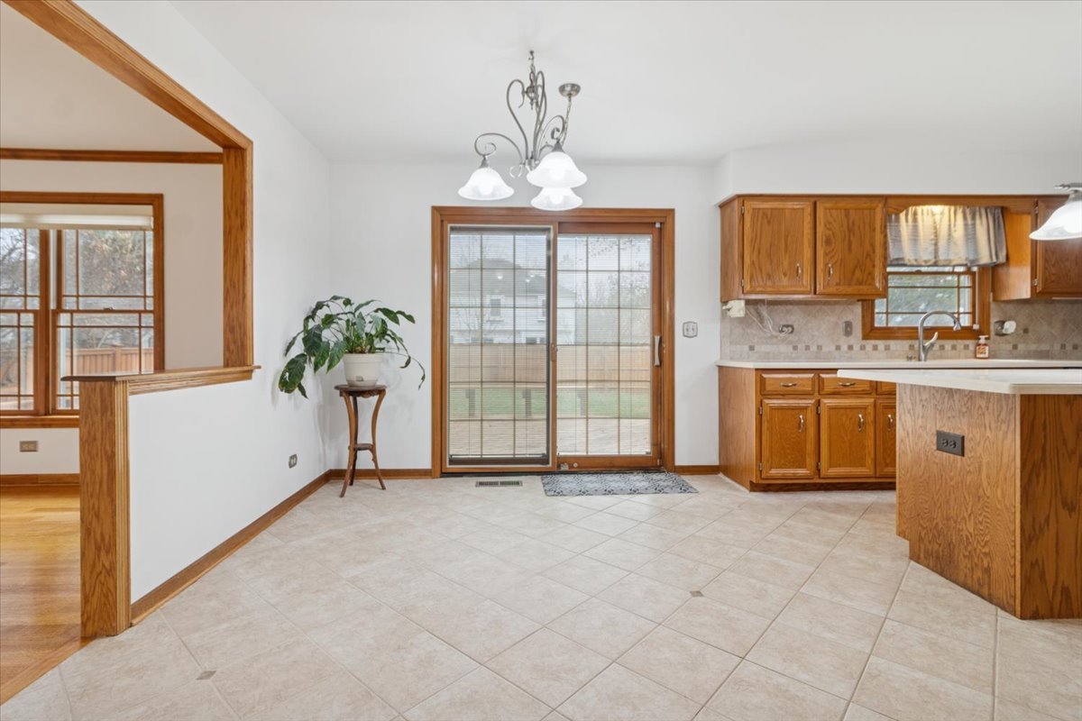 818 Wescott Road Bolingbrook, IL 60440 - Photo 9 of 33 a very nice looking kitchen with a large window