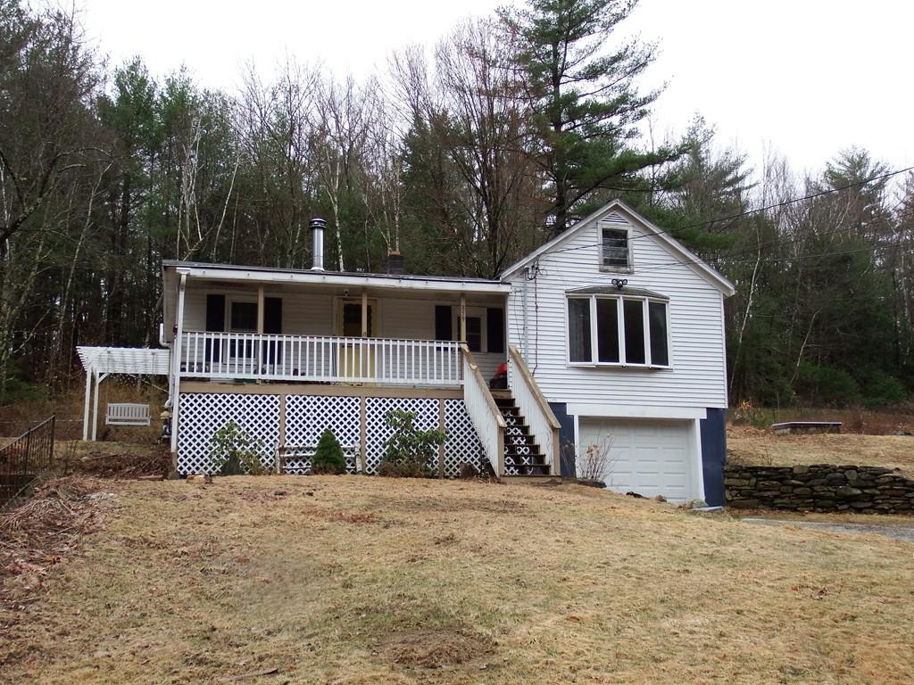 859 Turnpike Road Ashby, MA 01431 - Photo 1 of 22 a view of a house with a yard