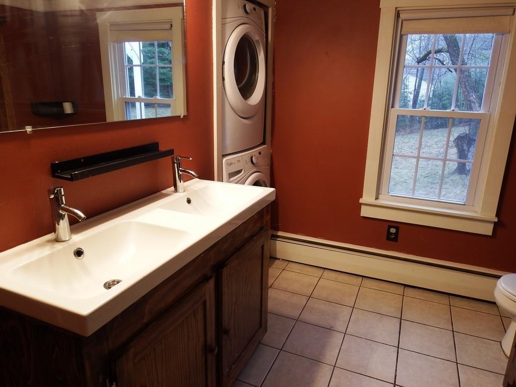 859 Turnpike Road Ashby, MA 01431 - Photo 18 of 22 a bathroom with a sink and a mirror
