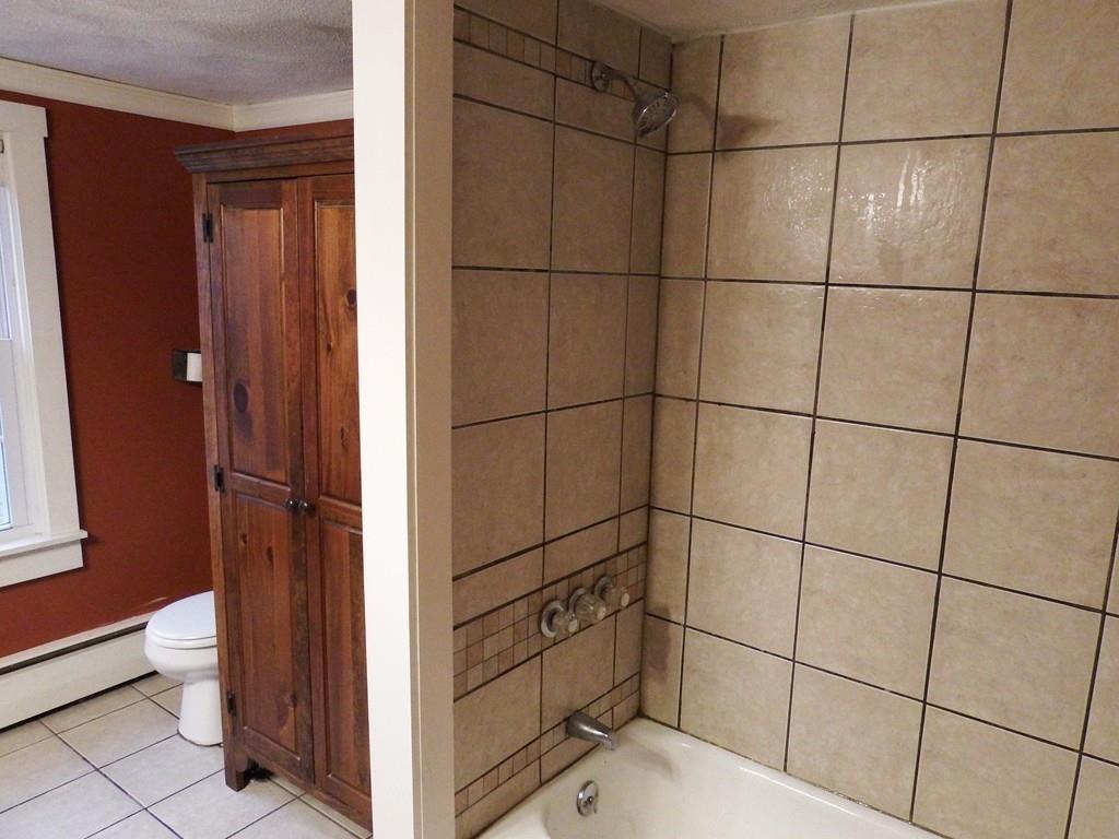 859 Turnpike Road Ashby, MA 01431 - Photo 19 of 22 a bathroom with a shower and a toilet