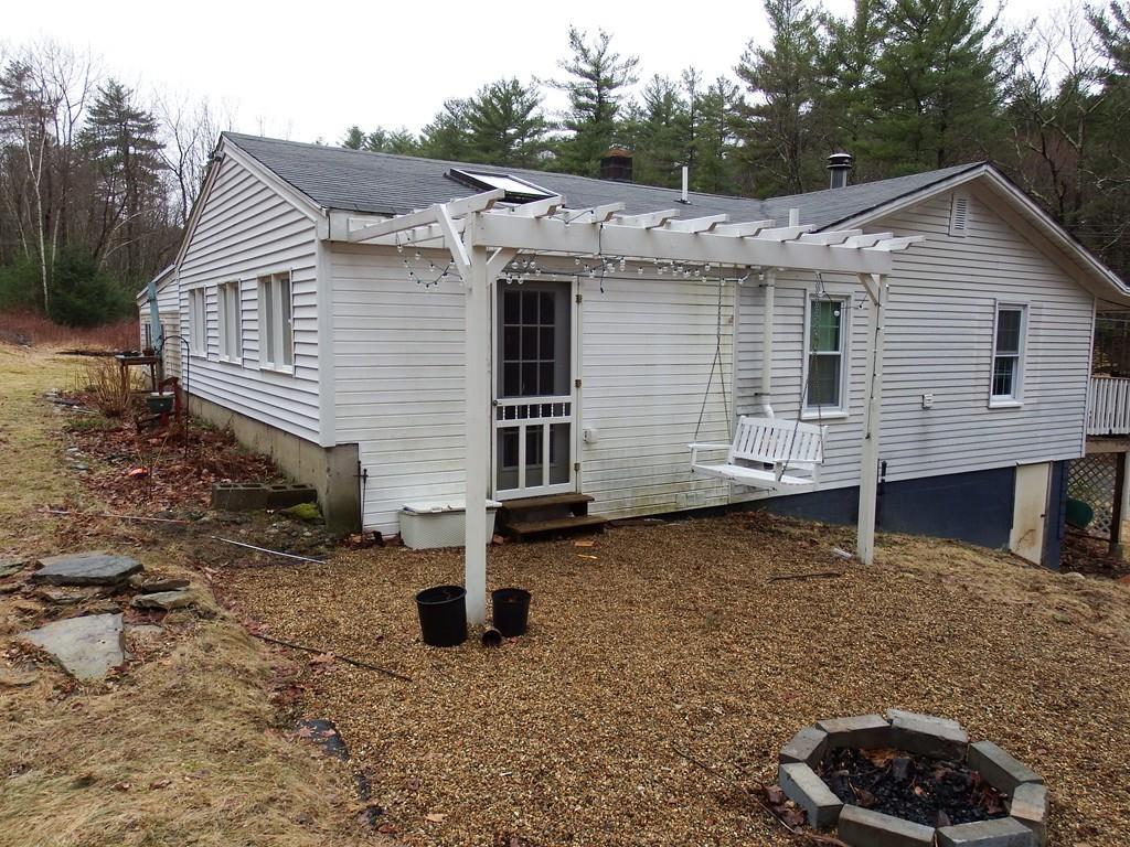 859 Turnpike Road Ashby, MA 01431 - Photo 21 of 22 a front view of a house with a yard