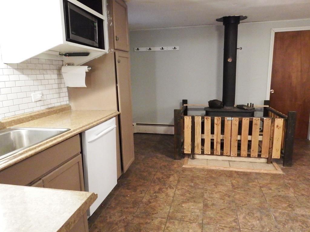 859 Turnpike Road Ashby, MA 01431 - Photo 5 of 22 a view of a kitchen