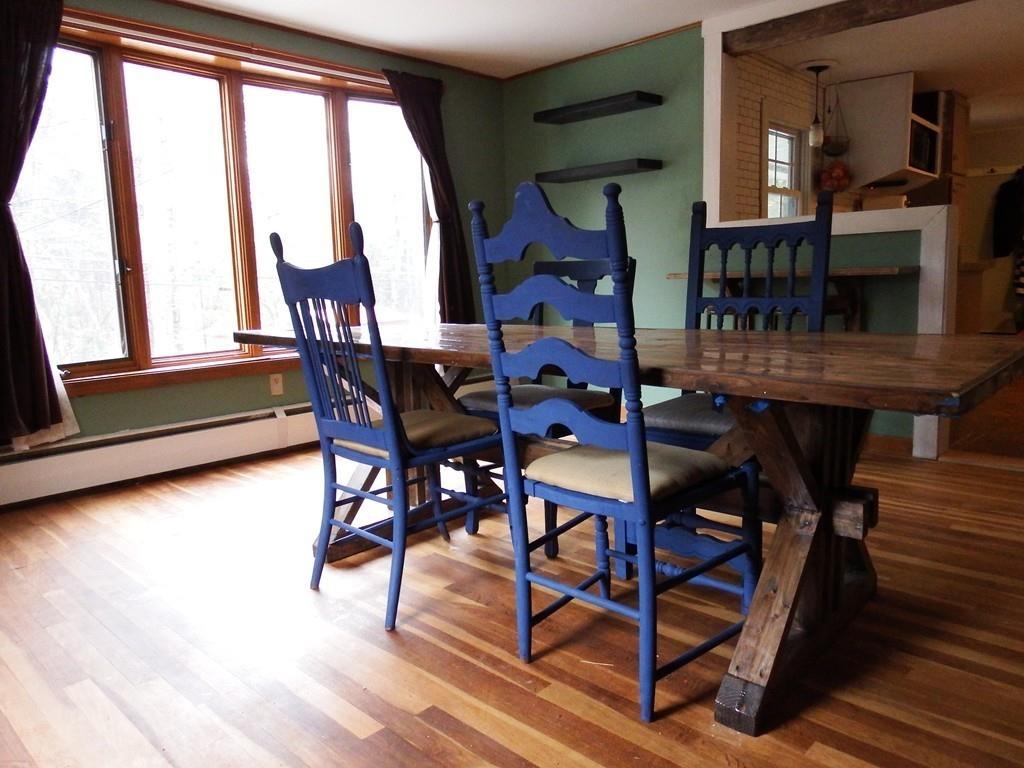 859 Turnpike Road Ashby, MA 01431 - Photo 8 of 22 a view of a dining room with furniture and window