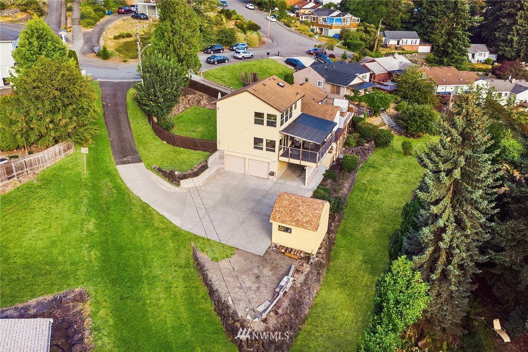 573 Bronson Place Northeast Renton, WA 98056 - Photo 28 of 32 an aerial view of residential house with outdoor space and swimming pool