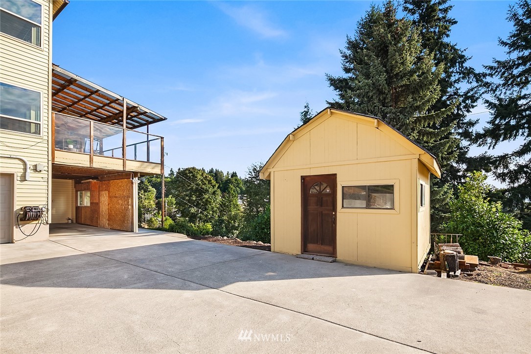 573 Bronson Place Northeast Renton, WA 98056 - Photo 29 of 32 a view of a house with a outdoor space