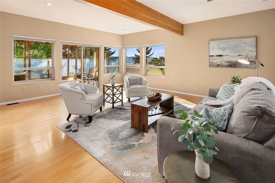 573 Bronson Place Northeast Renton, WA 98056 - Photo 5 of 32 a living room with furniture rug and window