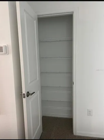 a view of walk in closet