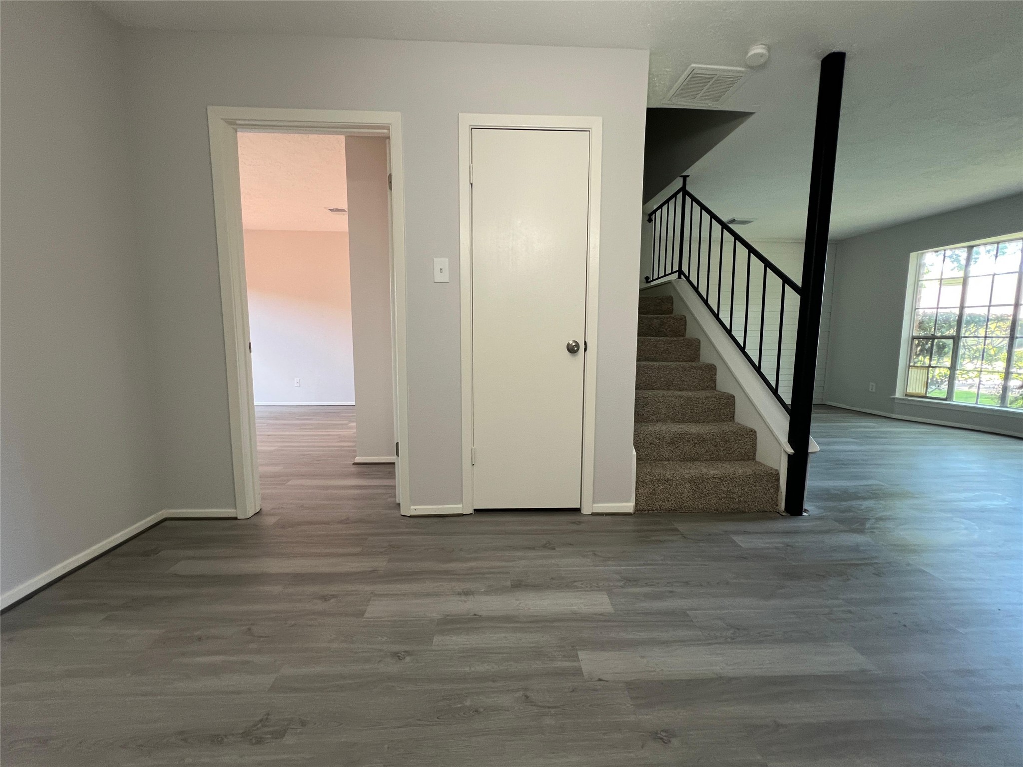 7012 Jetty Lane Houston, TX 77072 - Photo 8 of 24 a view of an entryway with wooden floor