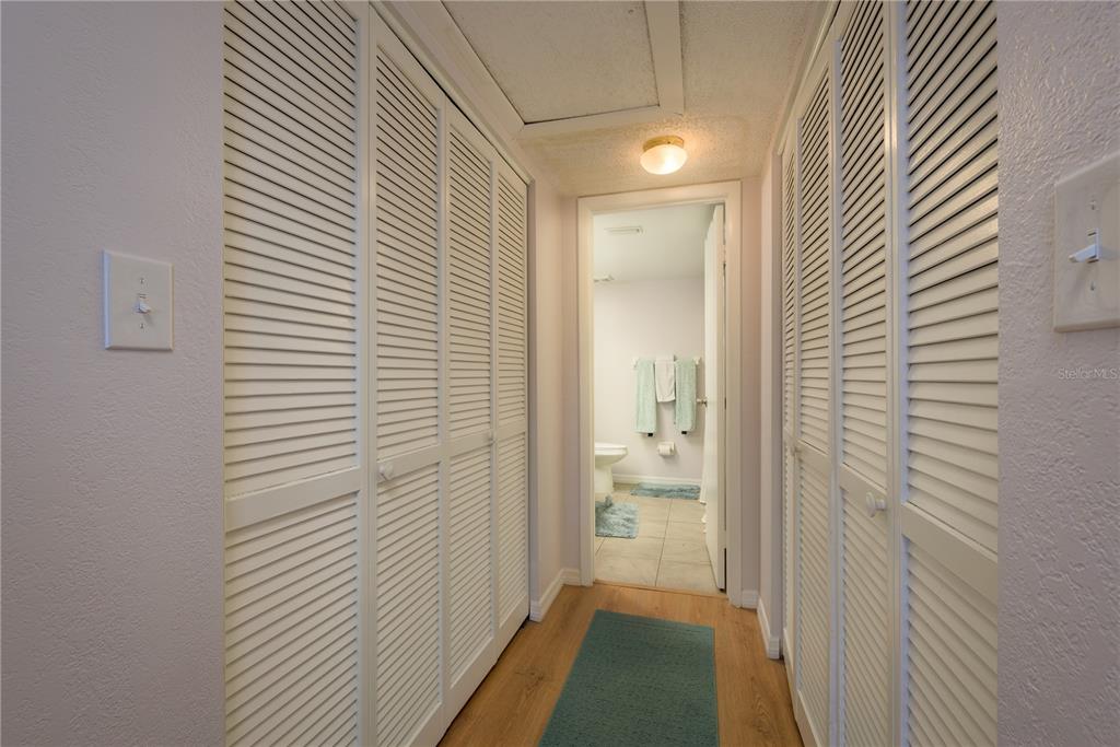 102 Anclote Road Tarpon Springs, FL 34689 - Photo 21 of 42 a view of a bathroom from a hallway