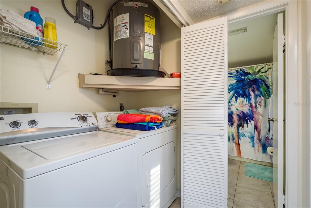 102 Anclote Road Tarpon Springs, FL 34689 - Photo 26 of 42 a utility room with dryer and washer