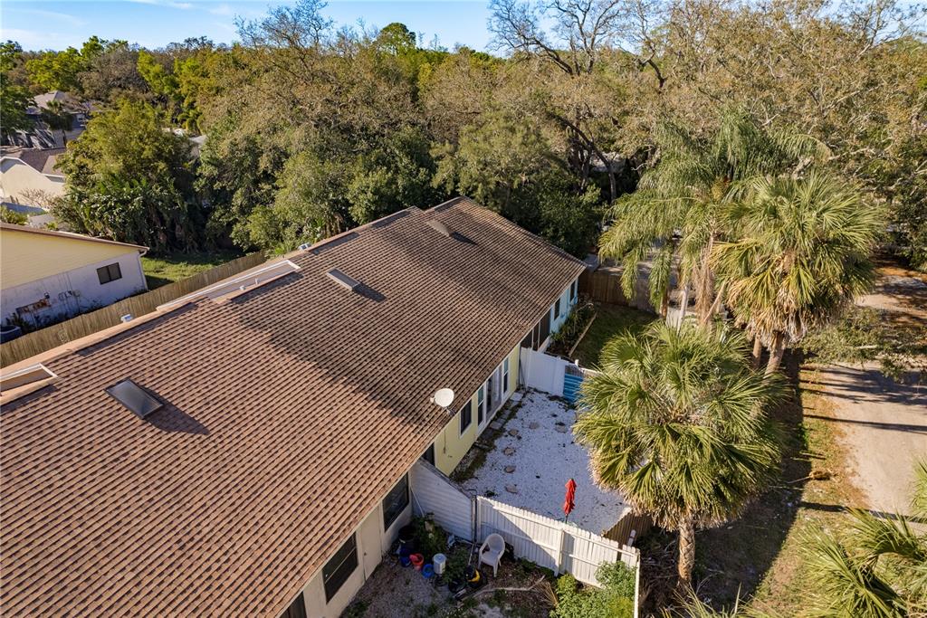 102 Anclote Road Tarpon Springs, FL 34689 - Photo 39 of 42 a view of a house with a tree